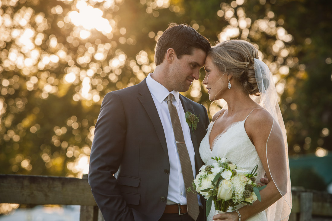 bride and groom sunset farm wedding